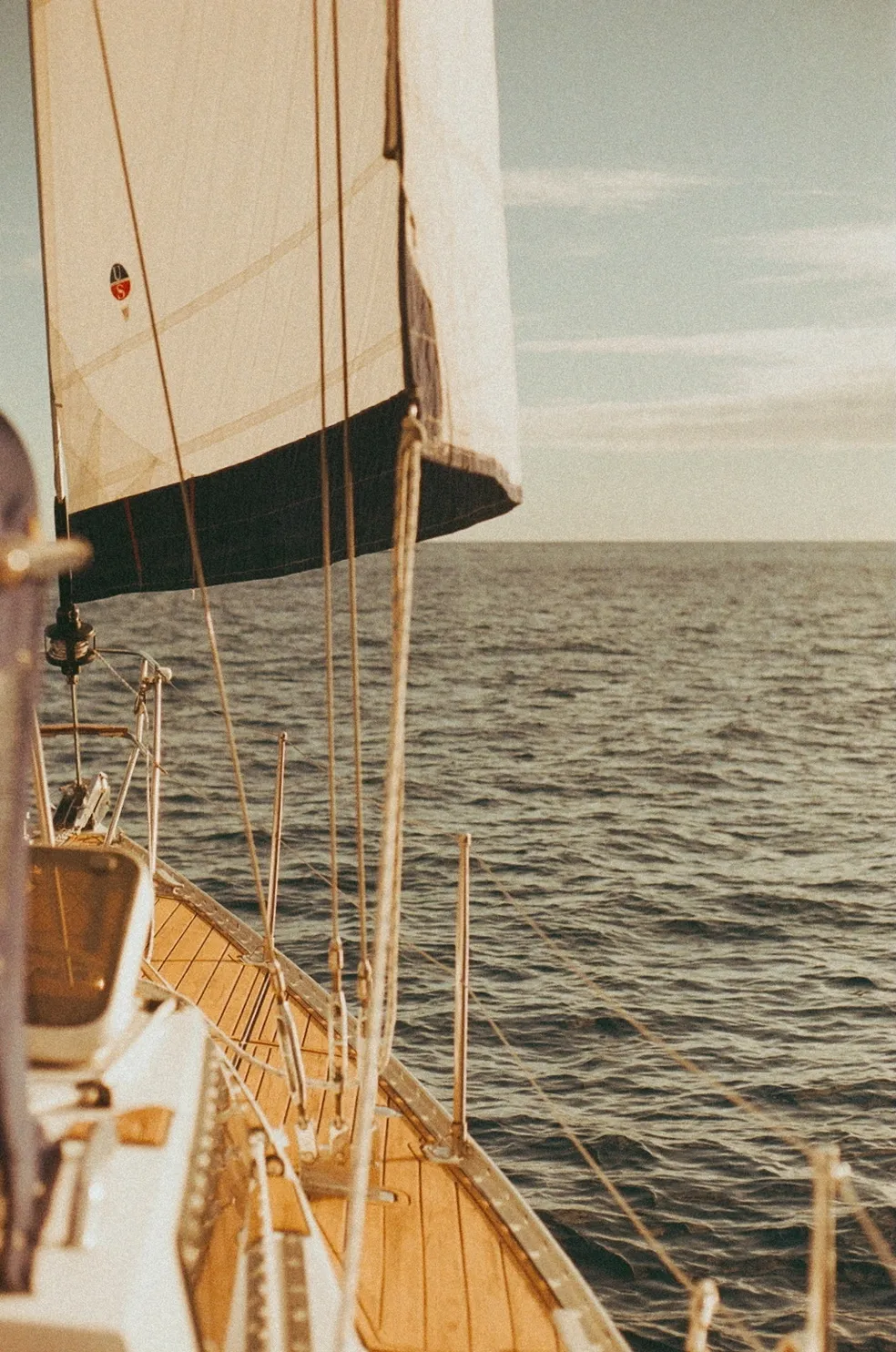 Deck and horizon on film aboard Sailing Beauty.