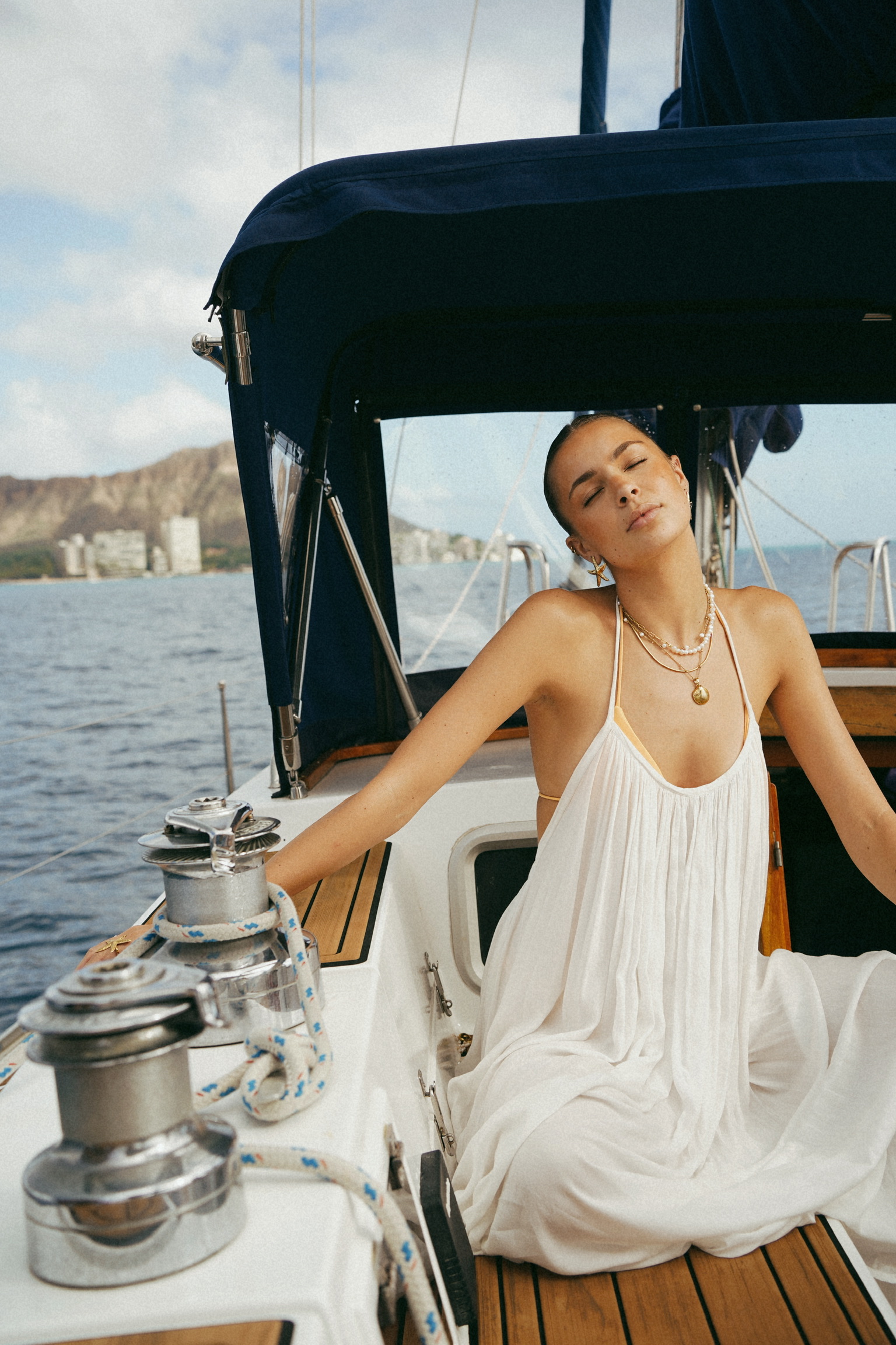 Couple portrait by Sharkey aboard Sailing Beauty.